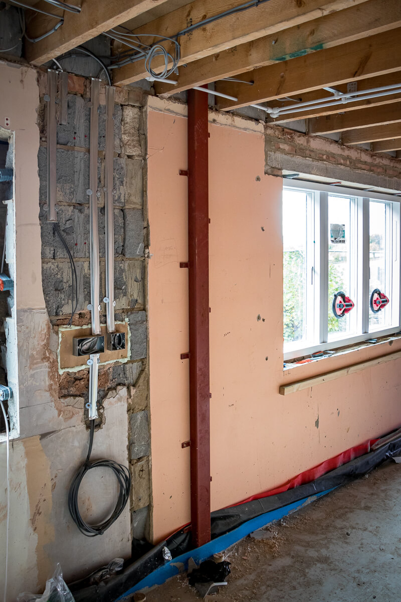 With the 1980s shell now stripped back to its bare masonry, we are focused on the vital internal systems and structural integrity of Woolridge View.