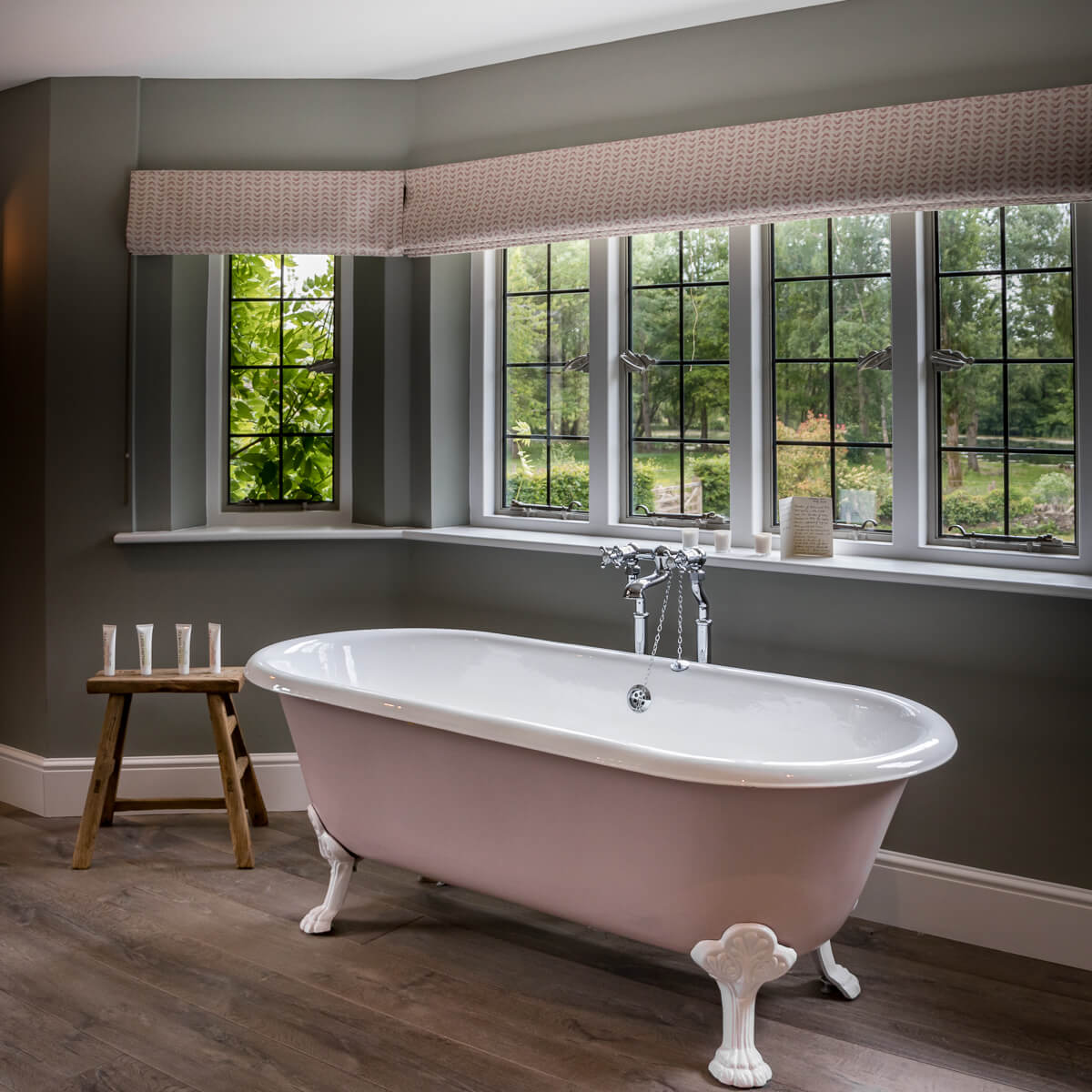 A comprehensive renovation of a Grade II listed Cotswold cottage, blending period charm with contemporary refinement across three stunning floors.